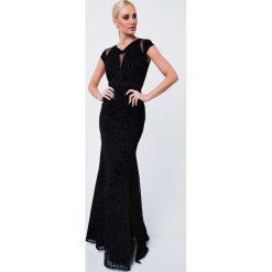 Sukinia we wzory długa czarna G5034. Czarne sukienki damskie Fasardi, xl, bez wzorów, bez kołnierzyka, z długim rękawem, długie, maxi. Za 79,00 zł.