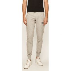 Tommy Hilfiger - Spodnie. Szare spodnie męskie TOMMY HILFIGER, xl, bez wzorów, z elastanu. W wyprzedaży za 299,90 zł.