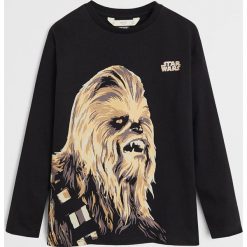 Mango Kids - Longsleeve dziecięcy Chew 110-164 cm. Czarne t-shirty chłopięce Mango Kids, z nadrukiem, z bawełny, z długim rękawem. Za 59,90 zł.