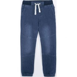 Coccodrillo - Spodnie dziecięce 92-116 cm. Niebieskie spodnie chłopięce COCCODRILLO, bez wzorów, z dzianiny. Za 89,90 zł.