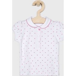 Blukids - Top dziecięcy 68-98 cm. Białe bluzki dziewczęce Blukids, bez wzorów, z elastanu, bez kołnierzyka, z krótkim rękawem, krótkie, bez kaptura. W wyprzedaży za 24,90 zł.