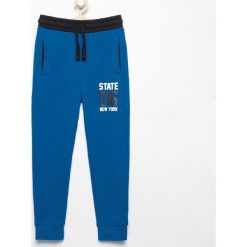 Spodnie dresowe - Niebieski. Niebieskie spodnie chłopięce marki Reserved, z dresówki. Za 49,99 zł.