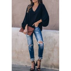 Bluzka damska MERZA BLACK. Czarne bluzki damskie IVET, na co dzień, xl, bez wzorów, z materiału, eleganckie, bez kołnierzyka, bez rękawów. W wyprzedaży za 89,00 zł.