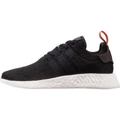 Adidas Originals NMD_R2 Tenisówki i Trampki core black/future harvest. Czarne tenisówki damskie marki adidas Originals, z materiału. W wyprzedaży za 398,30 zł.