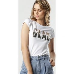 Biały T-shirt Blanka. Białe bluzki damskie Born2be, na co dzień, s, z nadrukiem, z dzianiny, z okrągłym kołnierzem, z krótkim rękawem. Za 69,99 zł.