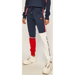 Ellesse - Spodnie. Niebieskie spodnie damskie Ellesse, bez wzorów, z bawełny. Za 219,90 zł.