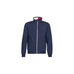 Kurtki krótkie Tommy Jeans TJM ESSENTIAL CASUAL BOMBER. Niebieskie kurtki męskie marki Tommy Jeans, s, bez wzorów, z jeansu, casualowe, krótkie, bez kaptura. Za 569,00 zł.