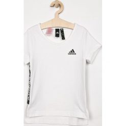 Adidas Performance - Top dziecięcy 116-170 cm. Białe bluzki dziewczęce adidas Performance, bez wzorów, z bawełny, z okrągłym kołnierzem, z krótkim rękawem, krótkie, bez kaptura. W wyprzedaży za 89,90 zł.