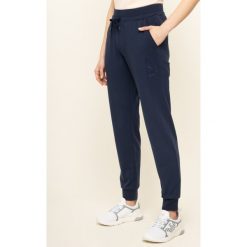Spodnie dresowe EA7 Emporio Armani 3HTP64 TJ31Z 1554. Niebieskie spodnie damskie EA7 Emporio Armani, xl, z elastanu. W wyprzedaży za 239,00 zł.