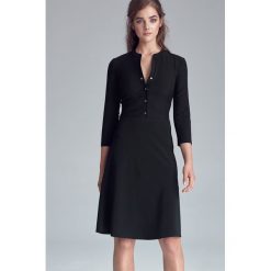 Czarna Casualowa Skromna Sukienka Zapinana na Napki. Czarne sukienki damskie Molly.pl, na co dzień, s, bez wzorów, eleganckie, bez kołnierzyka, bez rękawów, rozkloszowane. Za 189,90 zł.