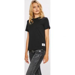Calvin Klein Jeans - Top. Czarne topy damskie Calvin Klein Jeans, m, z bawełny, z okrągłym kołnierzem. W wyprzedaży za 139,90 zł.