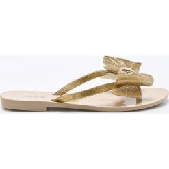 Melissa - Japonki. Żółte klapki damskie Melissa, bez wzorów, z gumy, bez obcasa. W wyprzedaży za 169,90 zł.