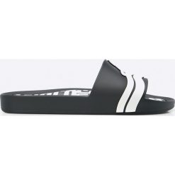Melissa - Klapki Anglomania by Vivienne Westwood. Czarne klapki damskie marki Melissa, z gumy, na płaskiej podeszwie. W wyprzedaży za 349,90 zł.