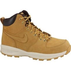 Brązowe Buty zimowe Nike Manoa Leather 454350-700. Pomarańczowe buty zimowe sportowe męskie Nike, na zimę, ze skóry, na sznurówki, trekkingowe. W wyprzedaży za 429,00 zł.