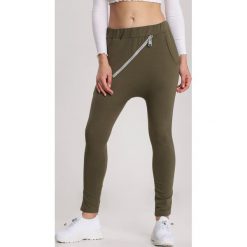 Khaki Spodnie Lorairena. Brązowe spodnie damskie Renee, xl, z dresówki. Za 79,99 zł.
