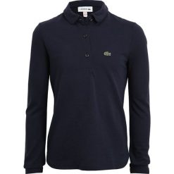 Lacoste Koszulka polo marine. Niebieskie t-shirty damskie Lacoste, z bawełny, polo. W wyprzedaży za 216,75 zł.