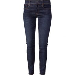 Polo Ralph Lauren SERRET Jeans Skinny Fit dark indigo. Niebieskie jeansy damskie relaxed fit Polo Ralph Lauren, z bawełny. Za 549,00 zł.