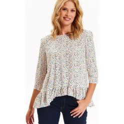 Bluzka damska z nadrukiem, z falbaną. Białe bluzki damskie Top Secret, z nadrukiem, eleganckie, z falbankami, bez rękawów. Za 89,99 zł.