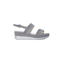 Sandały Melluso RENNA JEANS. Niebieskie sandały damskie marki Melluso, bez wzorów, z jeansu, bez obcasa, bez zapięcia. Za 365,94 zł.