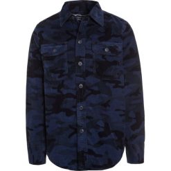 GAP CAMO Koszula dark indigo. Niebieskie bluzki dziewczęce marki GAP, z bawełny. W wyprzedaży za 135,20 zł.