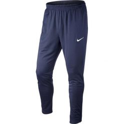 Chinosy chłopięce: Nike Spodnie juniorskie Libero Technical Knit granatowe r. L (588393)