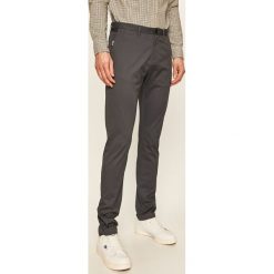 Tom Tailor Denim - Spodnie. Niebieskie spodnie męskie TOM TAILOR DENIM, m, bez wzorów, z elastanu. W wyprzedaży za 139,90 zł.