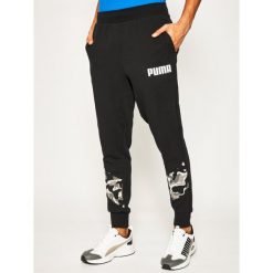 Spodnie dresowe Puma Rebel Camo Pants Cl Tr 582031. Czarne jeansy męskie Puma, m, bez wzorów. W wyprzedaży za 179,00 zł.