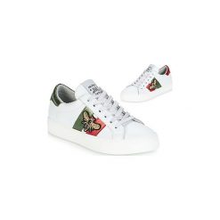 Buty Meline ROSSA. Białe trampki i tenisówki damskie marki Meline, bez wzorów, bez zapięcia. Za 423,20 zł.