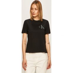 Calvin Klein Jeans - T-shirt. Żółte bluzki damskie Calvin Klein Jeans, s, z nadrukiem, z bawełny, casualowe, z okrągłym kołnierzem, z krótkim rękawem. W wyprzedaży za 119,90 zł.