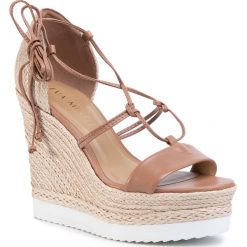 Espadryle EVA MINGE - EM-44-07-000542 687. Pomarańczowe espadryle damskie Eva Minge, bez wzorów, ze skóry, bez obcasa, na obcasie. W wyprzedaży za 319,00 zł.