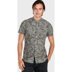 Tom Tailor Denim Koszula Zielony. Zielone koszule męskie TOM TAILOR DENIM, l, bez wzorów, z bawełny, bez kołnierzyka, z krótkim rękawem. Za 181,95 zł.