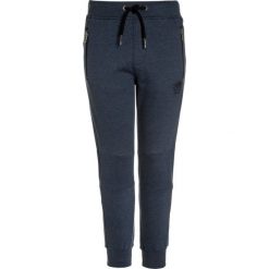 Petrol Industries TROUSERS Spodnie treningowe dark turquoise. Niebieskie jeansy chłopięce marki Petrol Industries. Za 129,00 zł.