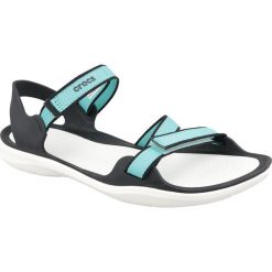 Crocs W Swiftwater Webbing Sandal 204804-4DY. Niebieskie klapki damskie Crocs, bez wzorów, z tkaniny, bez obcasa. W wyprzedaży za 189,99 zł.