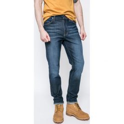 Mustang - Jeansy Tramper. Niebieskie jeansy męskie z dziurami marki Mustang. W wyprzedaży za 199,90 zł.