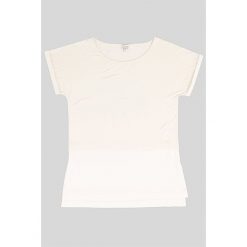 Koszulka "Soly" w kolorze biało-kremowym. Białe koszulki damskie Ateliers de la maille Paris, na co dzień, bez wzorów, z wiskozy, z okrągłym kołnierzem, bez rękawów. W wyprzedaży za 171,95 zł.