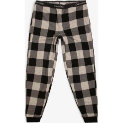 Calvin Klein - Damskie spodnie dresowe, szary. Szare spodnie damskie Calvin Klein, s, z dresówki, klasyczne. Za 269,95 zł.