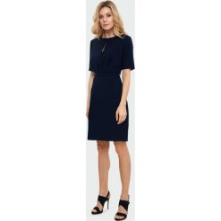 Sukienka rozkloszowana elegancka granatowa - 42. Sukienki damskie e-margeritka.pl, uniwersalny, bez wzorów, z poliesteru, eleganckie, z krótkim rękawem, krótkie, bez kaptura. Za 149,99 zł.
