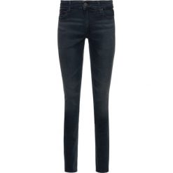 Jeansy Skinny Fit Tommy Jeans Simon DM0DM06413. Niebieskie jeansy męskie Tommy Jeans, m, bez wzorów, z elastanu. W wyprzedaży za 269,00 zł.