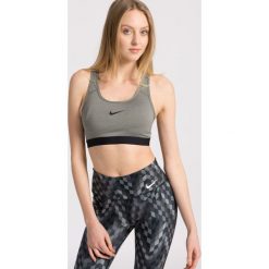 Nike - Biustonosz. Szare biustonosze sportowe Nike, z dzianiny. W wyprzedaży za 119,90 zł.