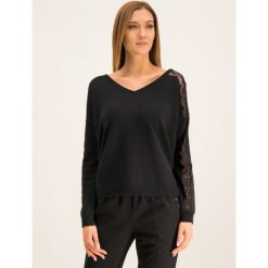 Sweter Liu Jo C69274 MA12J. Czarne swetry damskie Liu Jo, xs, bez wzorów, z wełny, klasyczne, bez rękawów, bez kaptura. W wyprzedaży za 509,00 zł.