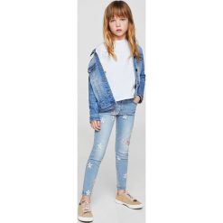Mango Kids - Jeansy dziecięce Arizona 110-164 cm. Niebieskie jeansy dziewczęce marki Mango Kids, z aplikacjami, z bawełny. Za 99,90 zł.