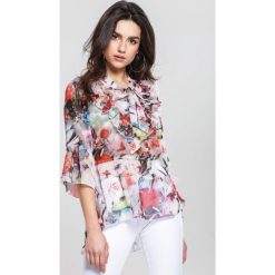 Różowa Bluzka Intermix. Różowe bluzki damskie other, s, bez wzorów, bez kołnierzyka, z krótkim rękawem. Za 49,99 zł.