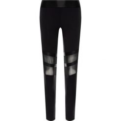 Legginsy Guess W94B83 K9770. Czarne spodnie damskie Guess, s, z aplikacjami, z elastanu. W wyprzedaży za 199,00 zł.
