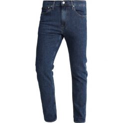 Calvin Klein Jeans 026 SLIM Jeansy Slim Fit blue denim. Niebieskie jeansy męskie marki Calvin Klein Jeans, z elastanu. Za 419,00 zł.