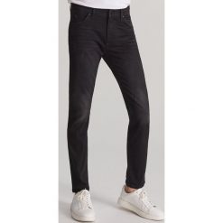 Jeansy slim z efektem sprania - Czarny. Czarne jeansy męskie Reserved, m, bez wzorów. Za 169,99 zł.