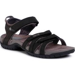 Sandały TEVA - Tirra Leather 4177 Blk. Czarne klapki damskie Teva, bez wzorów, ze skóry, bez obcasa. W wyprzedaży za 339,00 zł.