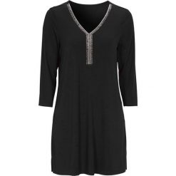 Cellbes Tunika czarny female czarny 58/60. Czarne tuniki damskie Cellbes, na co dzień, z aplikacjami, z dżerseju, eleganckie, z dekoltem w serek, bez rękawów. W wyprzedaży za 99,00 zł.