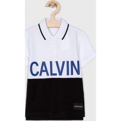 Calvin Klein Jeans - Polo dziecięce 104 - 176 cm. Szare t-shirty chłopięce Calvin Klein Jeans, z nadrukiem, z bawełny, z krótkim rękawem. W wyprzedaży za 159,90 zł.