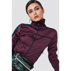 NA-KD Bluza sportowa z suwakiem - Purple. Fioletowe bluzy damskie NA-KD, w paski, z poliesteru, bez rękawów, bez kaptura, na golfa. W wyprzedaży za 101,47 zł.