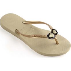 Havaianas - Japonki. Klapki damskie Havaianas, bez wzorów, z materiału, bez obcasa, na płaskiej podeszwie. W wyprzedaży za 69,90 zł.